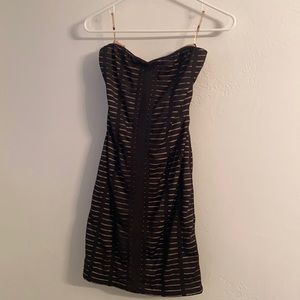Black and nude strapless mini dress